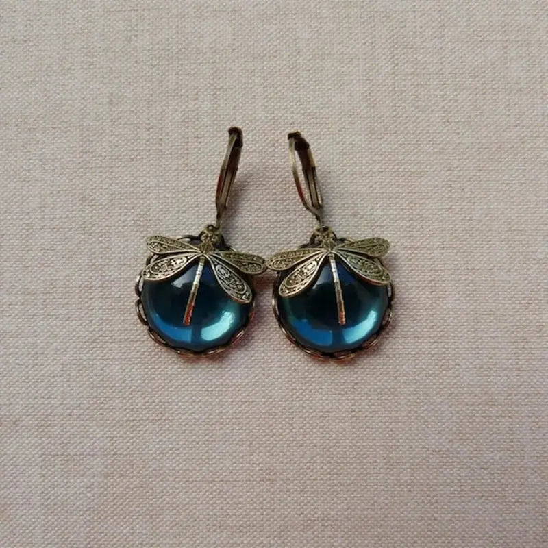 Spherical dragonfly earrings in antique golden