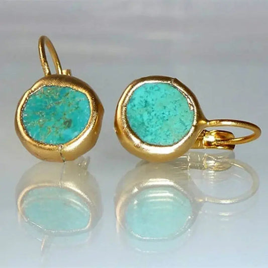 Golden earrings with turquoise stone